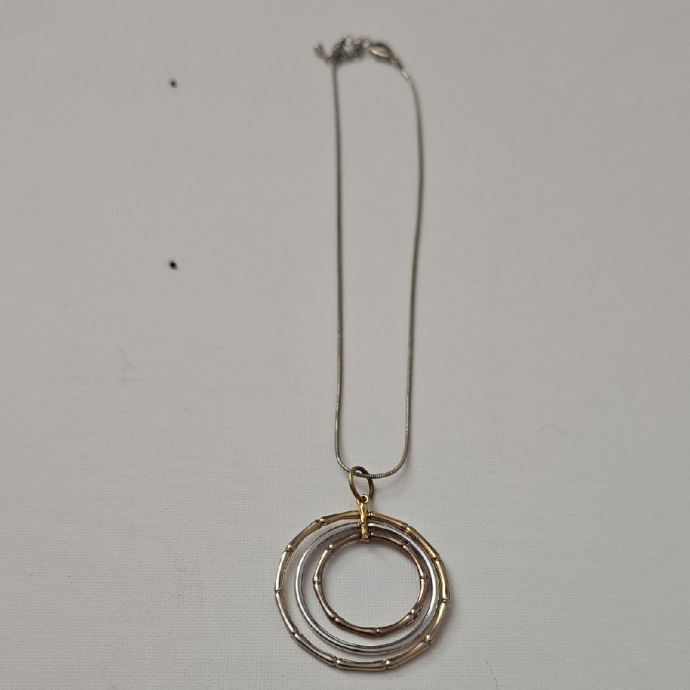 Elegant Gold and Silver Pendant Necklace